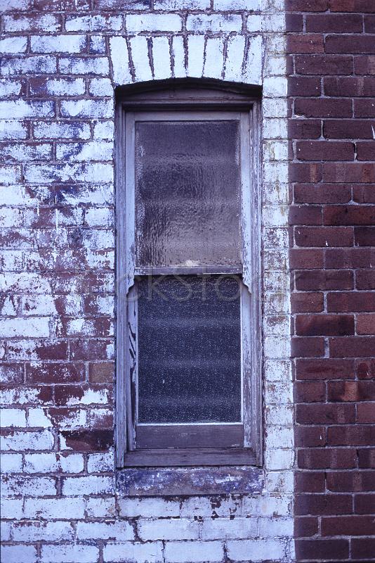 an old window in need of painting