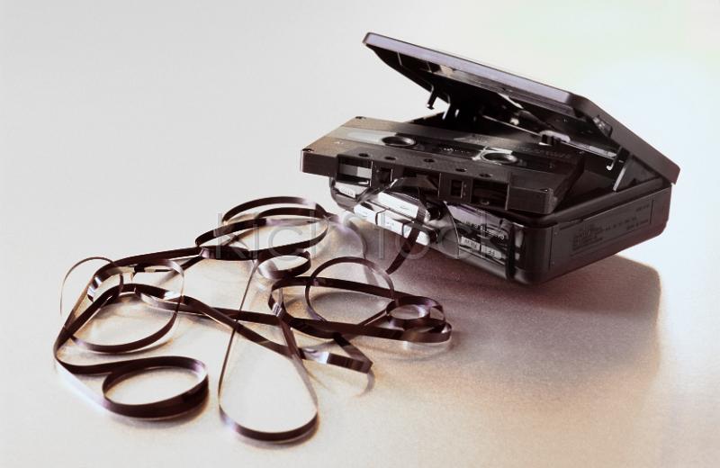 old personal stereo casette player and tangled tape