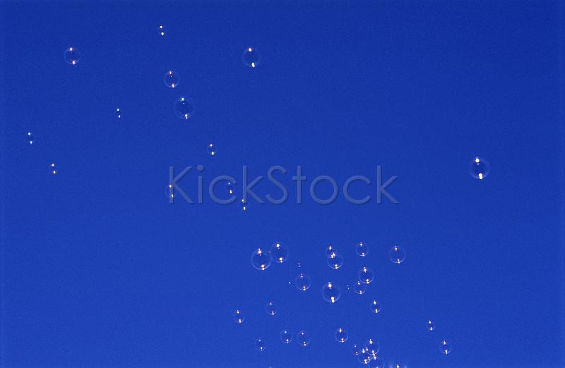 floating bubbles on a blue sky
